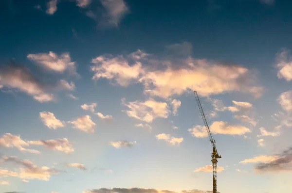 stock image Construction crane with a beautiful sky in the back