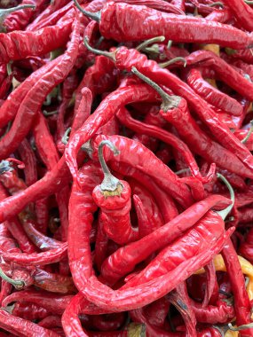 chilli peppers, hot peppers, pepperoni background, vegetables from the market