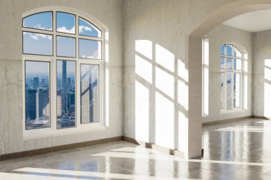 Penceresi ve minimalist oturma odası tasarımlı lüks bir çatı katı dairesi.