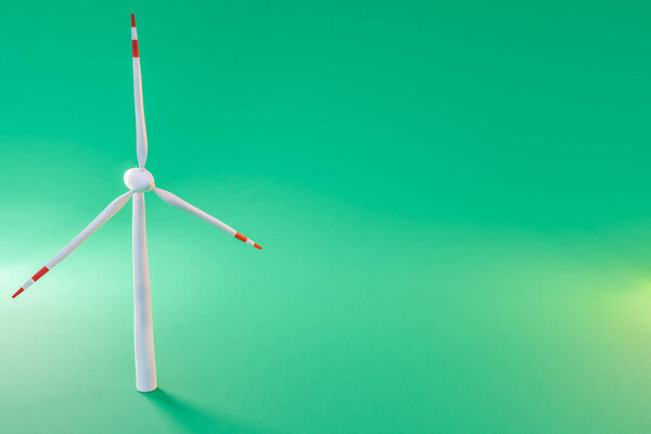 colorfull background; miniature windmill sustainablity renewable energy concept; 3d illustration