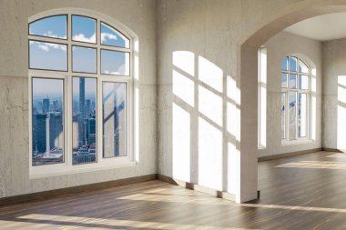 Penceresi ve minimalist oturma odası tasarımlı lüks bir çatı katı dairesi.