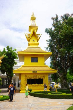 Golden building at the white Temple in WatRong Khun, Thailand clipart