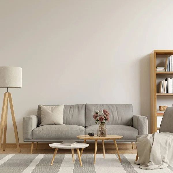 Living room interior with sofa, coffee tables, floor lamp and books on the shelves. Bright interior with large, empty mockup wall. 3D render. 3D illustration.