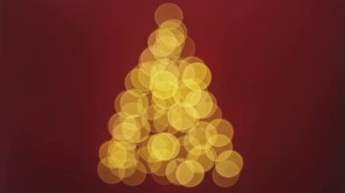 Noel ağacı şeklinde bulanık noel ışıklarının kusursuz döngüsü. Odaklanmamış ışıklar Noel süslemesi.