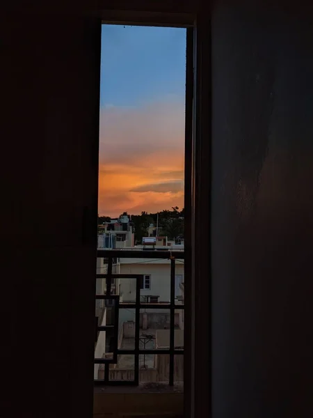 Bright Orange Blue Clouds Open Doors View — Stock Photo, Image