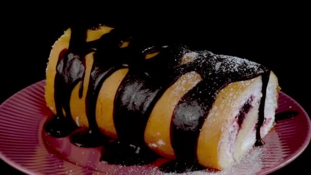 Pouring Powdered Sugar Biscuit Swiss Roll Butter Cream Black Background — Stockvideo