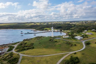 Drone aerial photograph of the Currie Harbour Lighthouse in Currie on King Island in Tasmania in Australia