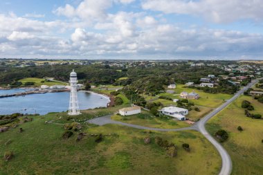Drone aerial photograph of the Currie Harbour Lighthouse in Currie on King Island in Tasmania in Australia