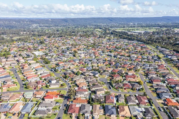 stock image Drone aerial photograph of houses and roads in the suburb of Glenmore Park in New South Wales in Australia