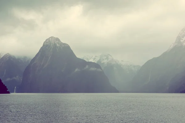 Photograph Mountains Clouds Mist Viewed Water Milford Sound Fiordland National — Stock Photo, Image