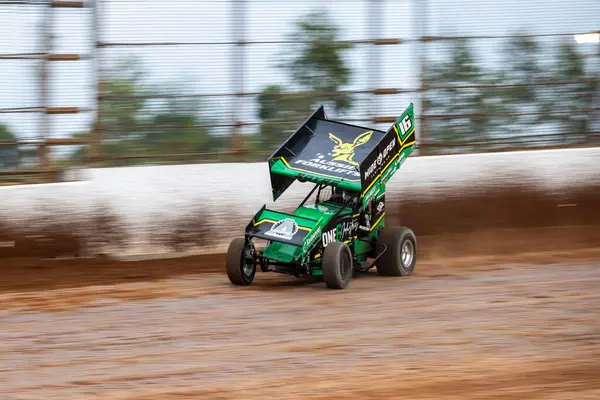 stock image SYDNEY, NEW SOUTH WALES, AUSTRALIA - March 23, 2024 : Driver Daniel Sayre racing in the SprintCar Dirt Track Racing Series at Sydney International Speedway.