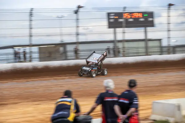 stock image SYDNEY, NEW SOUTH WALES, AUSTRALIA - March 23, 2024 : Driver Warren Ferguson racing in the SprintCar Dirt Track Racing Series at Sydney International Speedway.