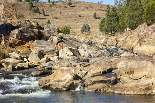 stock image Photograph of water flowing in Adelong creek near the Adelong Falls Gold Mine ruins in the Snowy Mountains in New South Wales in Australia.