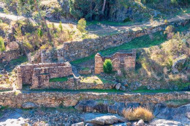 Photograph of the old brick buildings at the Adelong Falls Gold Mine ruins in the Snowy Mountains in New South Wales in Australia. clipart