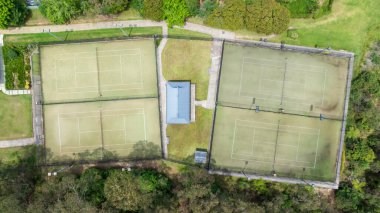 Drone aerial photograph of the tennis courts at the Winmalee and District Tennis Club in the Blue Mountains in New South Wales, Australia. clipart