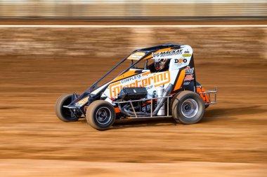 SYDNEY, NEW SOUTH WALES, AUSTRALIA - January 18, 2025: Driver Jordan Mackay in round 6 of the Australian Speedcar Series Track Championship at the Sydney International Speedway, NSW, Australia. clipart