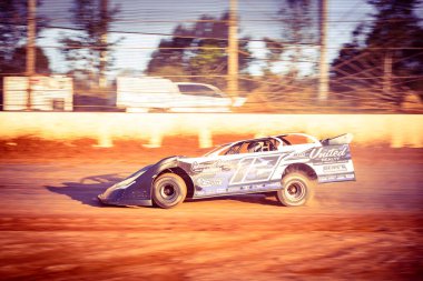 SYDNEY, NEW SOUTH WALES, AUSTRALIA - October 26, 2024: Driver Darryl Grimson in the Late Models Series championship at the Sydney International Speedway in Sydney, NSW, Australia. clipart