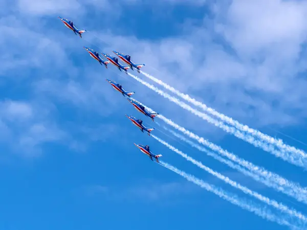 stock image Normandy, France - June 8, 2024: Patrouille de France aerobatic patrol in the sky during an air show marking the 80th anniversary of D-Day landing of Allied forces in Normandy, France, Aromanches