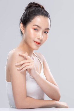 Beautiful Asian woman looking at camera smile with clean and fresh skin Happiness and cheerful with positive emotional,isolated on white background. Beauty and Cosmetics Concept. Proud her self.