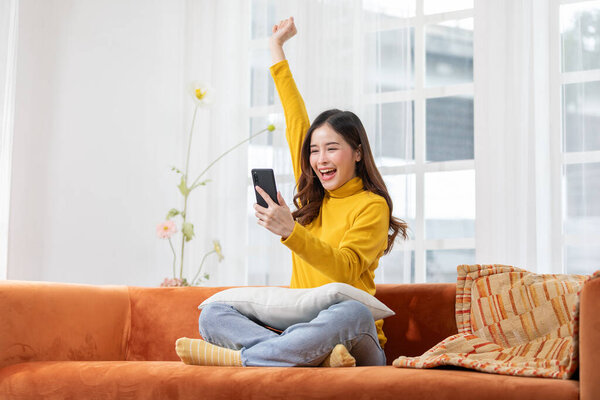 Millennial Asian Young Woman Looking Mobile Phone Laughing Good News Royalty Free Stock Photos
