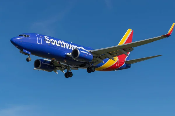 Stock image Burbank, California, United States - April 4, 2023: Southwest Airlines Boeing 737 with registration N773SA shown approaching the Hollywood Burbank Airport for landing.