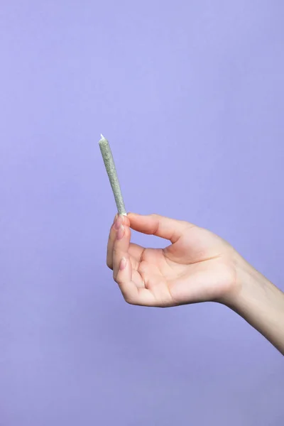Woman Hand Natural Nails Holds Joint Medical Marijuana Light Purple — Stock Photo, Image