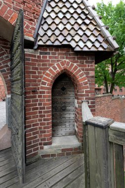 Guardhouse at the gate connecting upper and lower part of a medieval castle clipart