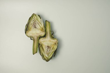 Halved Fresh Artichoke Isolated on White clipart