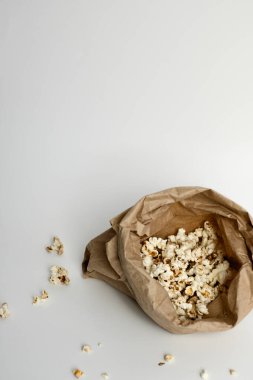 Eco-Friendly Paper Bag with Popcorn clipart