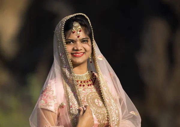 Beautiful Indian bride in traditional wedding clothes