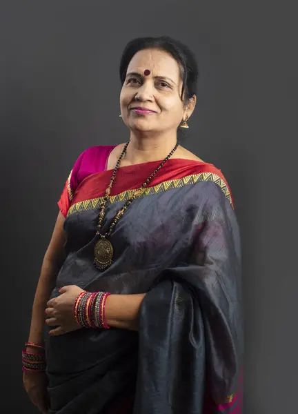 indian woman wearing saree stock photos - OFFSET