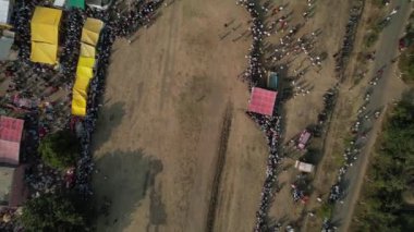 Bullock araba yarışının insansız hava aracı çekimi hasat festivali vesilesiyle, Bullock yarışı geleneksel çiftçi festivalidir..