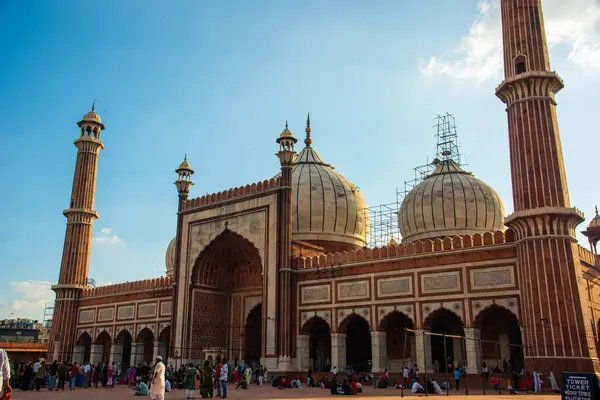 stock image DELHI, INDIA, August 23, 2022 : Worshipers and tourist visit to the Jama Masjid Mosque, The mosque is the largest and most famous in India