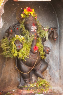 The traditional Hindu religion sculpture Inside of Meenakshi hindu temple in Madurai, Tamil Nadu, India. clipart