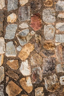 Antik taş duvarın arka planı, eski kale taşı duvar dokusu, taş yüzeylerin deseni..