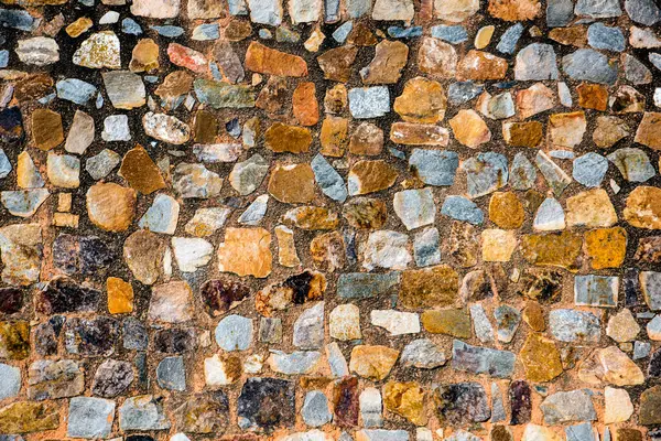 Antik taş duvarın arka planı, eski kale taşı duvar dokusu, taş yüzeylerin deseni..