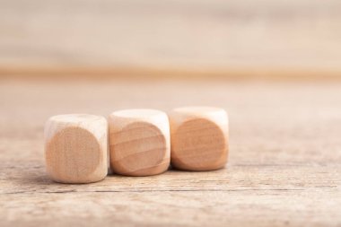 wooden blocks,on a brown background, Group of blank wooden blocks, cubes copy space for business text background such as idea, goal, plan concept
