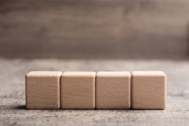 wooden blocks,on a brown background, Group of blank wooden blocks, cubes copy space for business text background such as idea, goal, plan concept