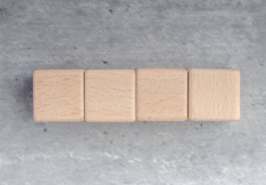 wooden blocks,on a brown background, Group of blank wooden blocks, cubes copy space for business text background such as idea, goal, plan concept