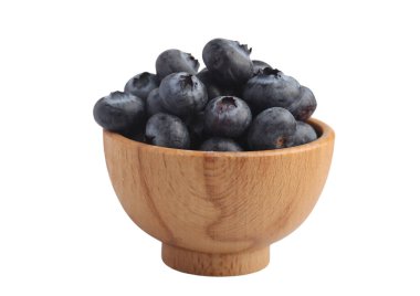 Blueberries in a wooden cup on a white background