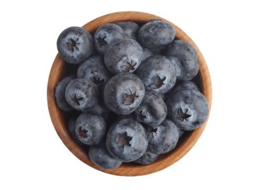Blueberries in a wooden cup on a white background