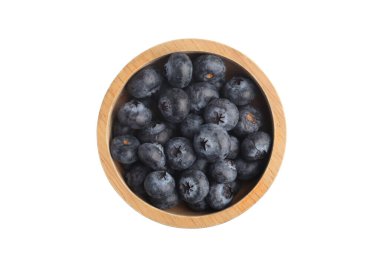 Blueberries in a wooden cup on a white background