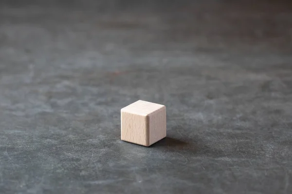 stock image Empty wooden dice on gray background