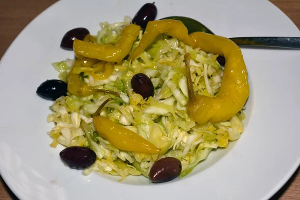 Salad Yellow Pepper Pods Cabbage Olives Plate Close — Fotografie, imagine de stoc