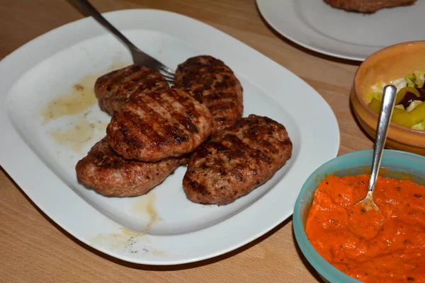 Plate Meat Cutlets Wooden Table Sauce Close — Stock Fotó