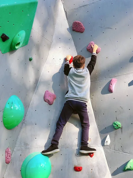 Teenage Boy Crawling Rock Climbing Wall Training Rear View — Stock Photo, Image