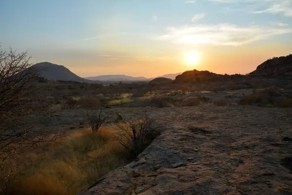 stock image Sunset in the background among desert arid mountains. Natural landscape reserve. Landscape wild nature