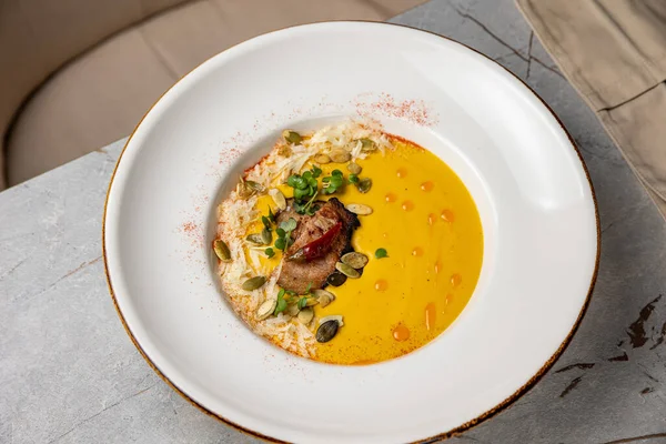 stock image delicious soup prepared in the restaurant by the chef