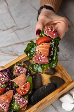 delicious bruschetta with tuna and salmon