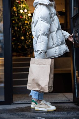 delivery in the restaurant, the girl takes out a package with food
